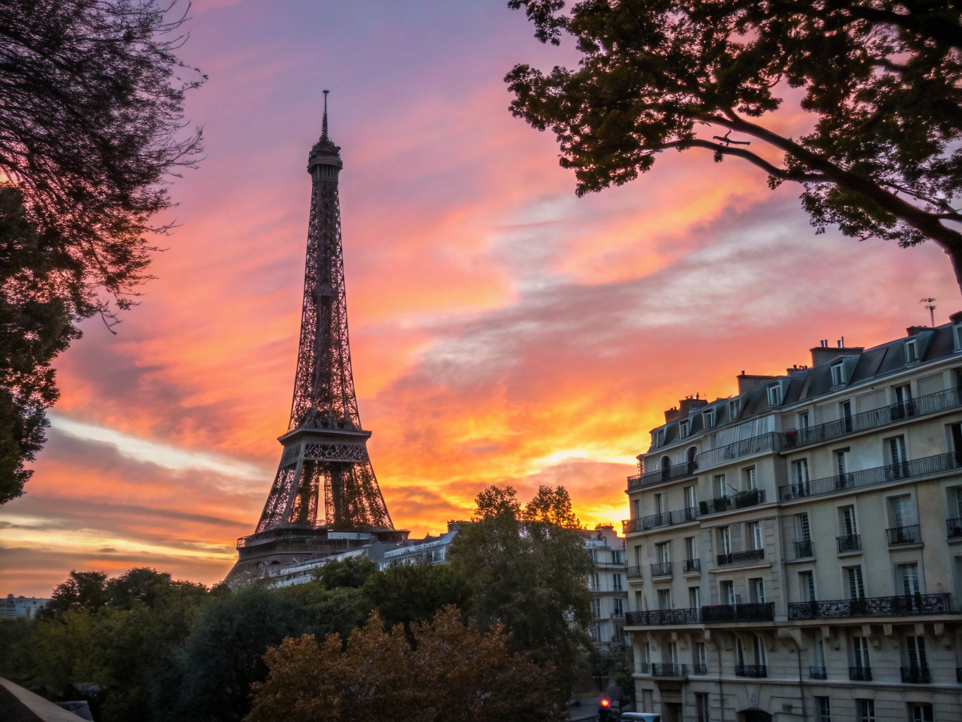 Iconic Eiffel Tower rising above the Parisian skyline during a golden sunrise