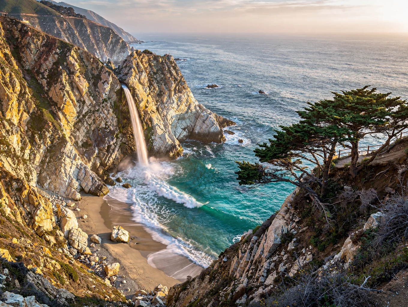 McWay Falls cascading directly into the turquoise cove waters of Big Sur