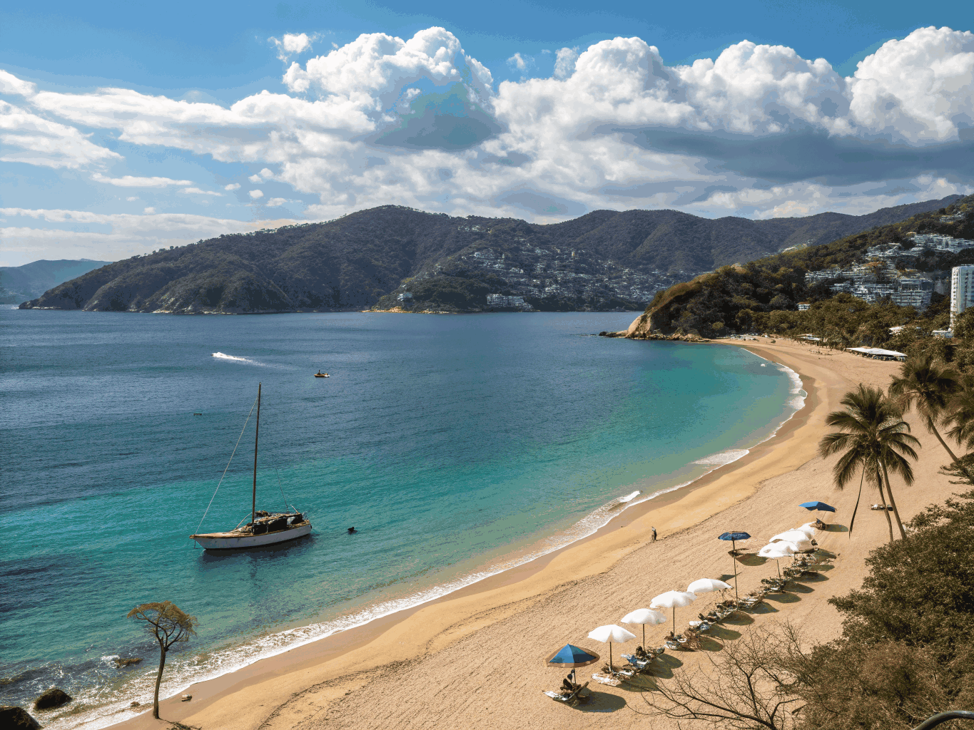 Sunny sandy cove and quiet blue bay sheltered by coastal bluffs in Avila Beach
