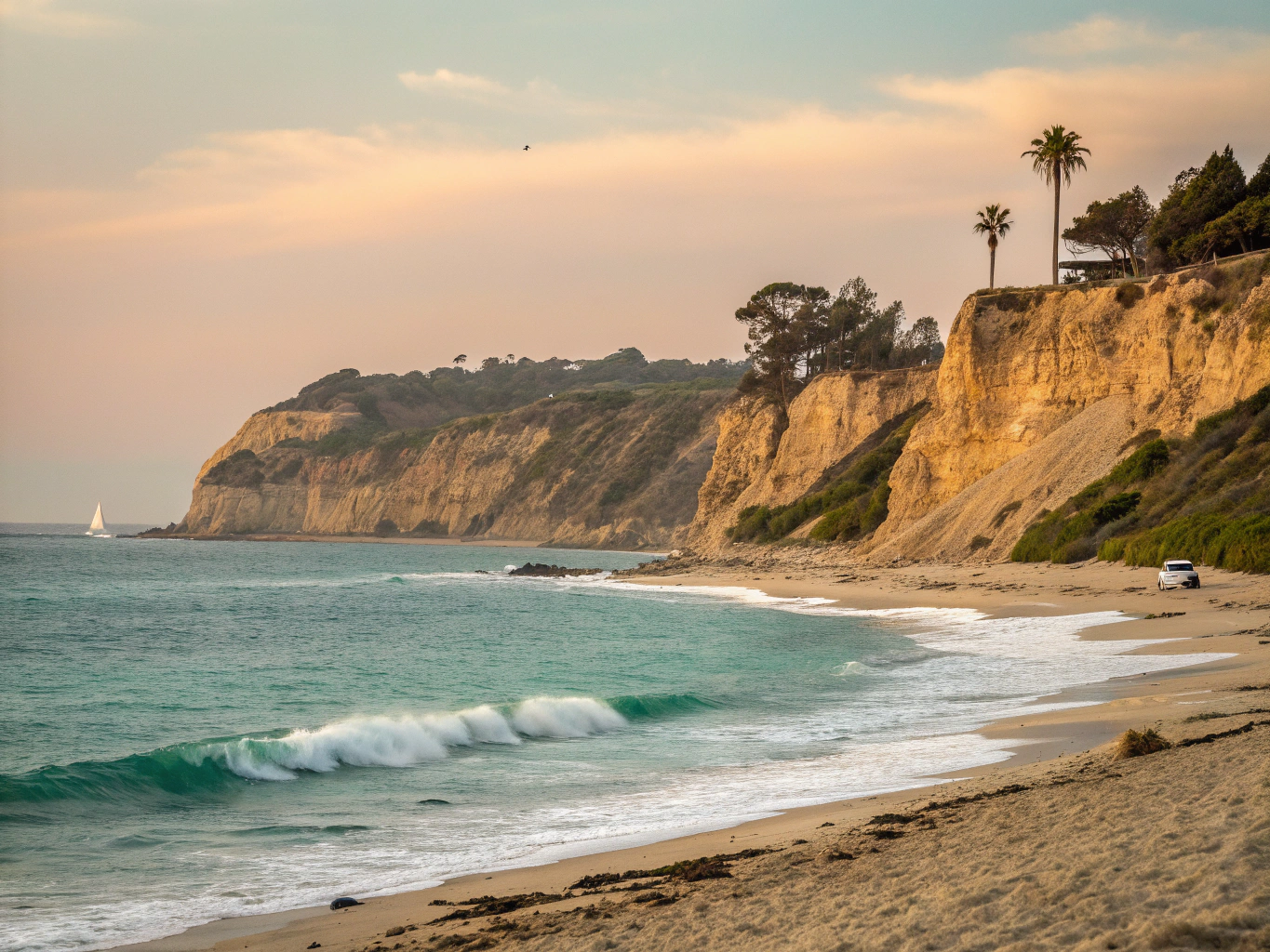 Spanish colonial white-stucco arches and terracotta tile roofs overlooking Santa Barbara ocean palm trees