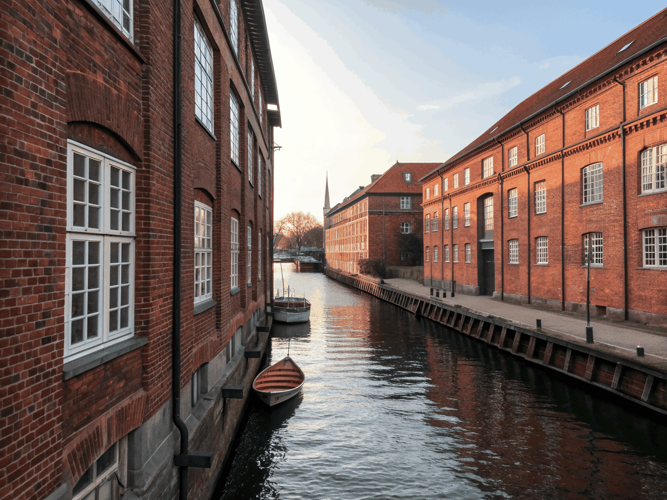 Vibrant waterfront townhouses and yachts along the Copenhagen canal