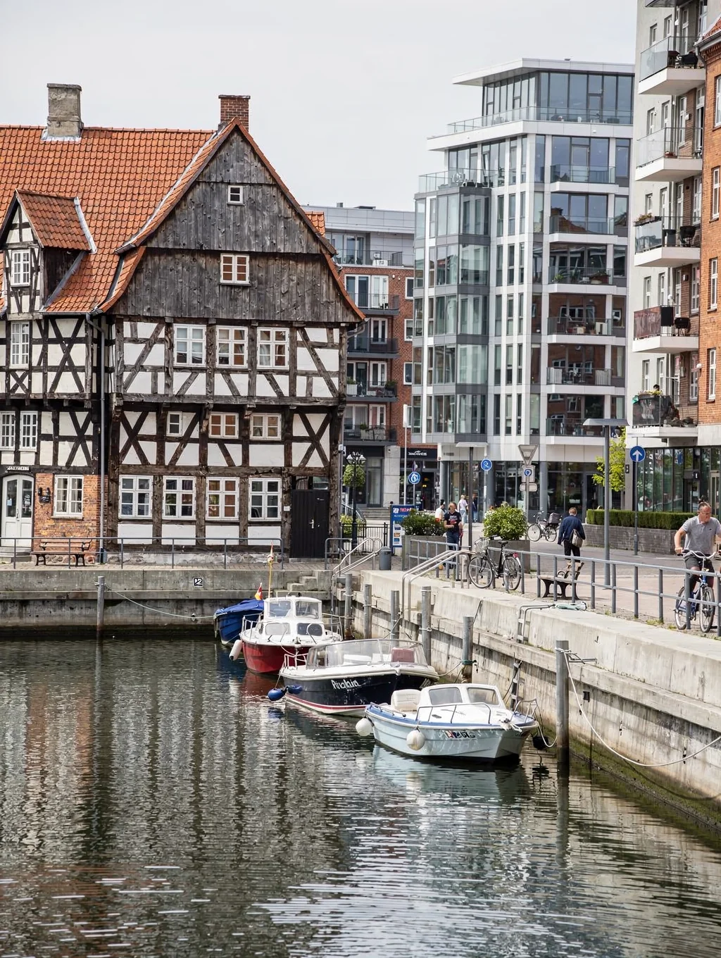 Historic timber-framed Danish merchant quarters and modern canal docks in Aarhus