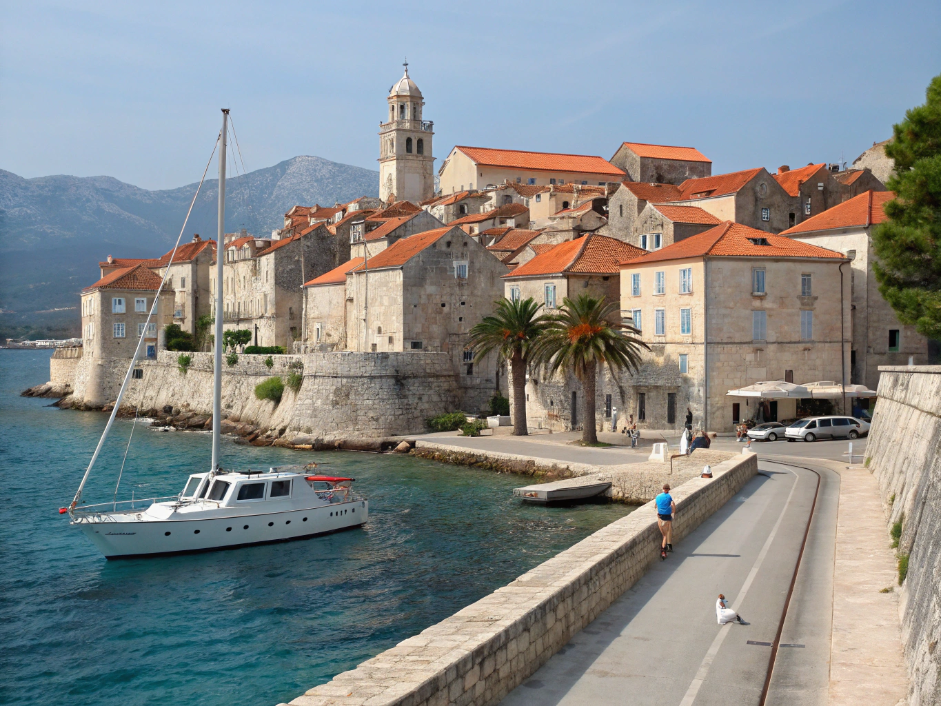 Clear Adriatic waters meeting ancient stone ramparts in Croatia