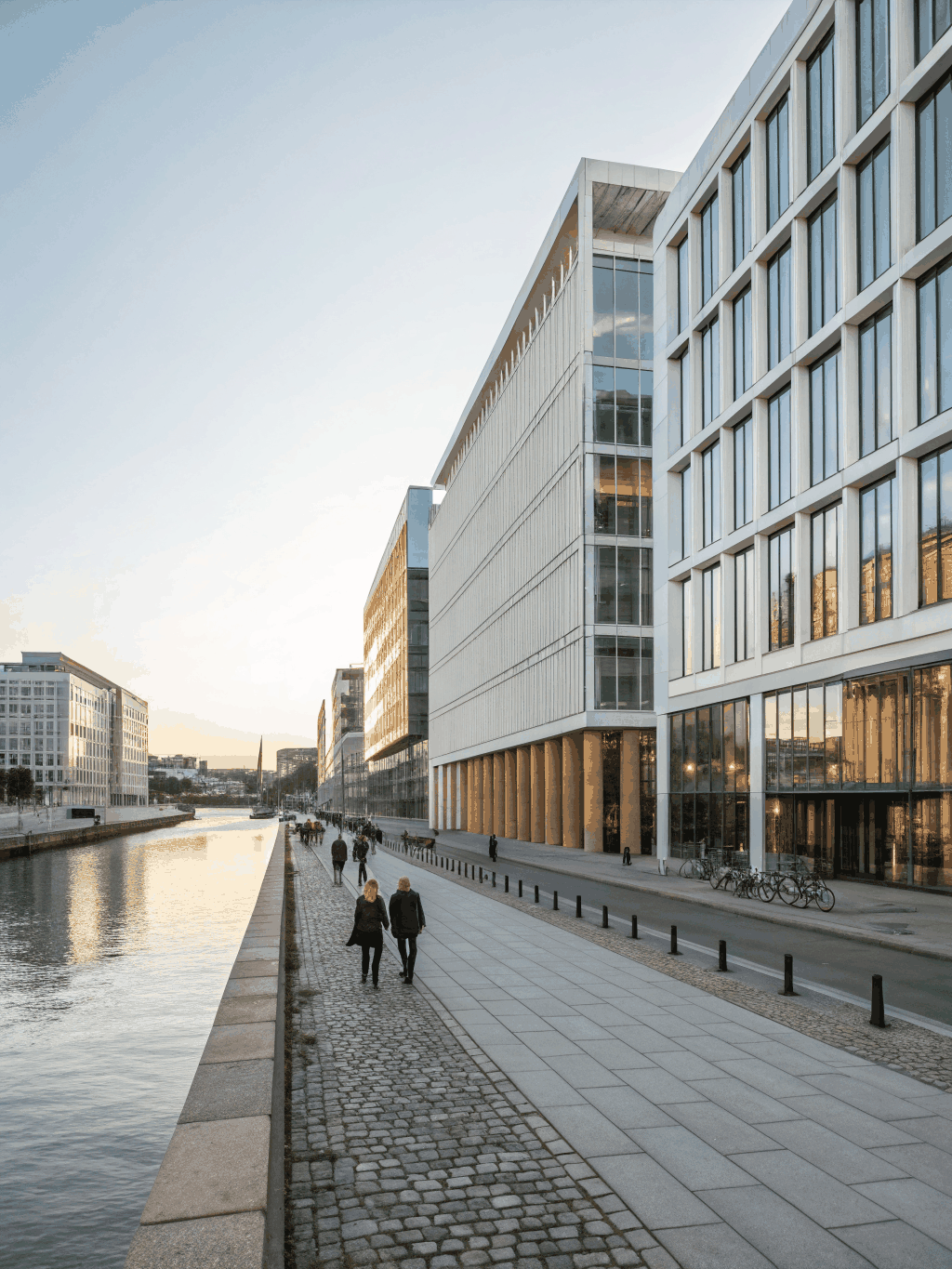 Clean Scandinavian harbor architecture and waterfront promenades bathed in morning light in Helsinki