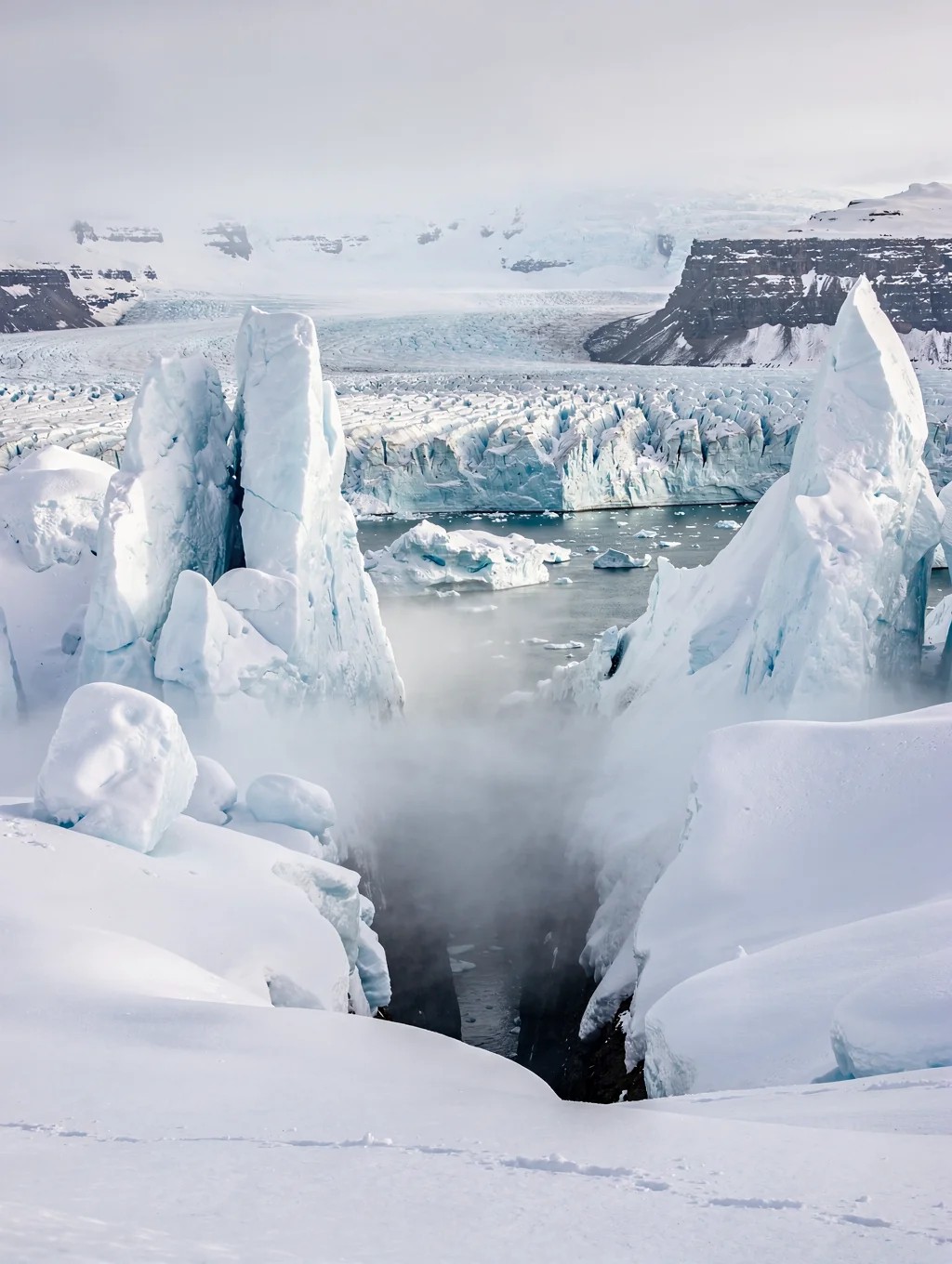 Massive blue glacial ice wall and floating pack ice under high-arctic skies in Svalbard
