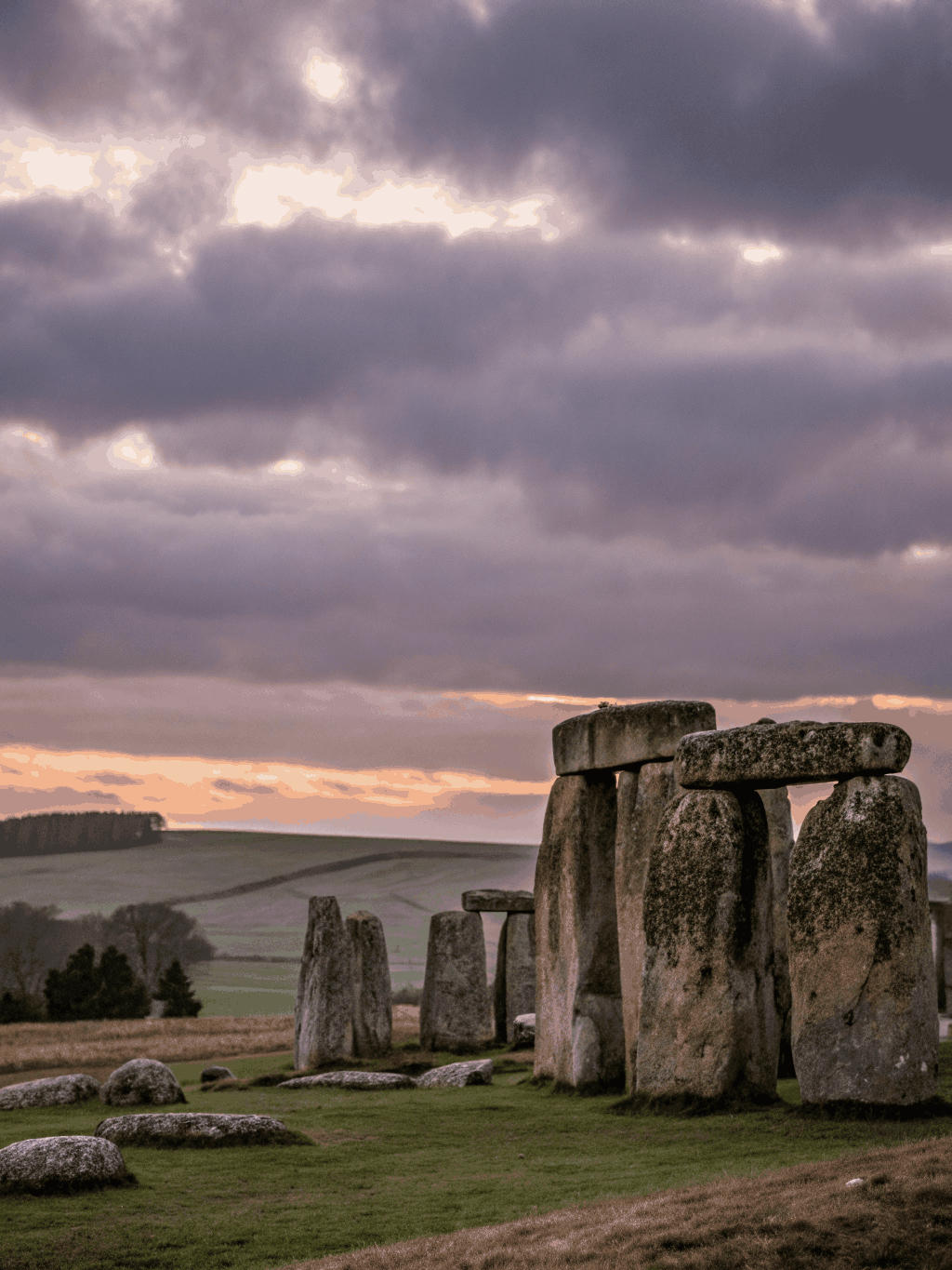 Ancient prehistoric megaliths of Stonehenge standing under a dramatic sky in Wiltshire England