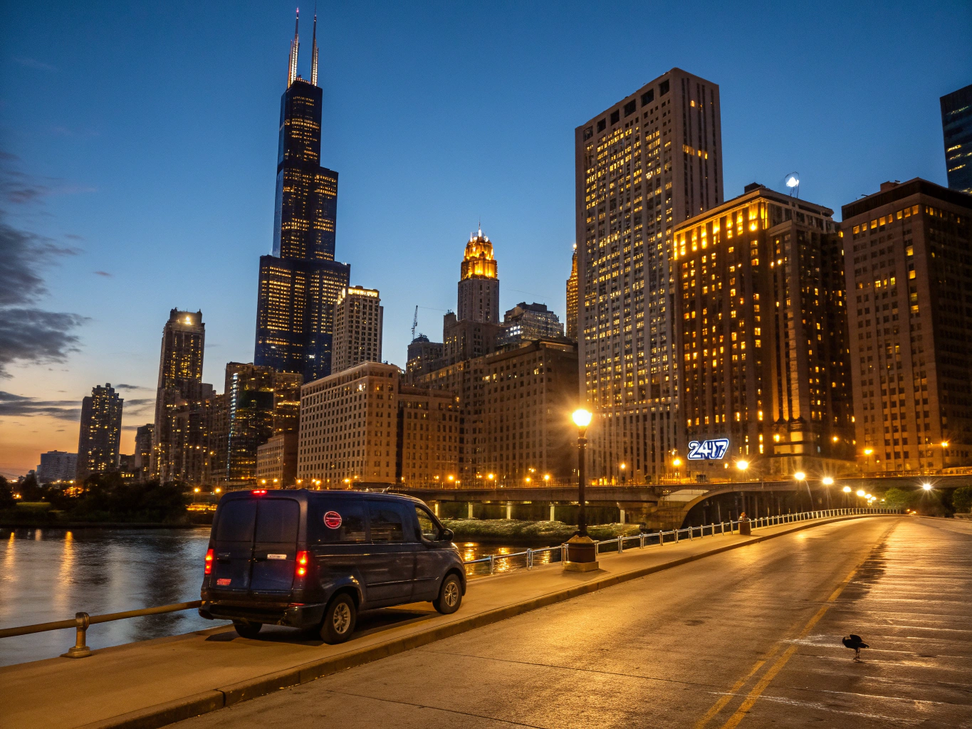 Historic Route 66 Begin street sign mounted against downtown Chicago architecture
