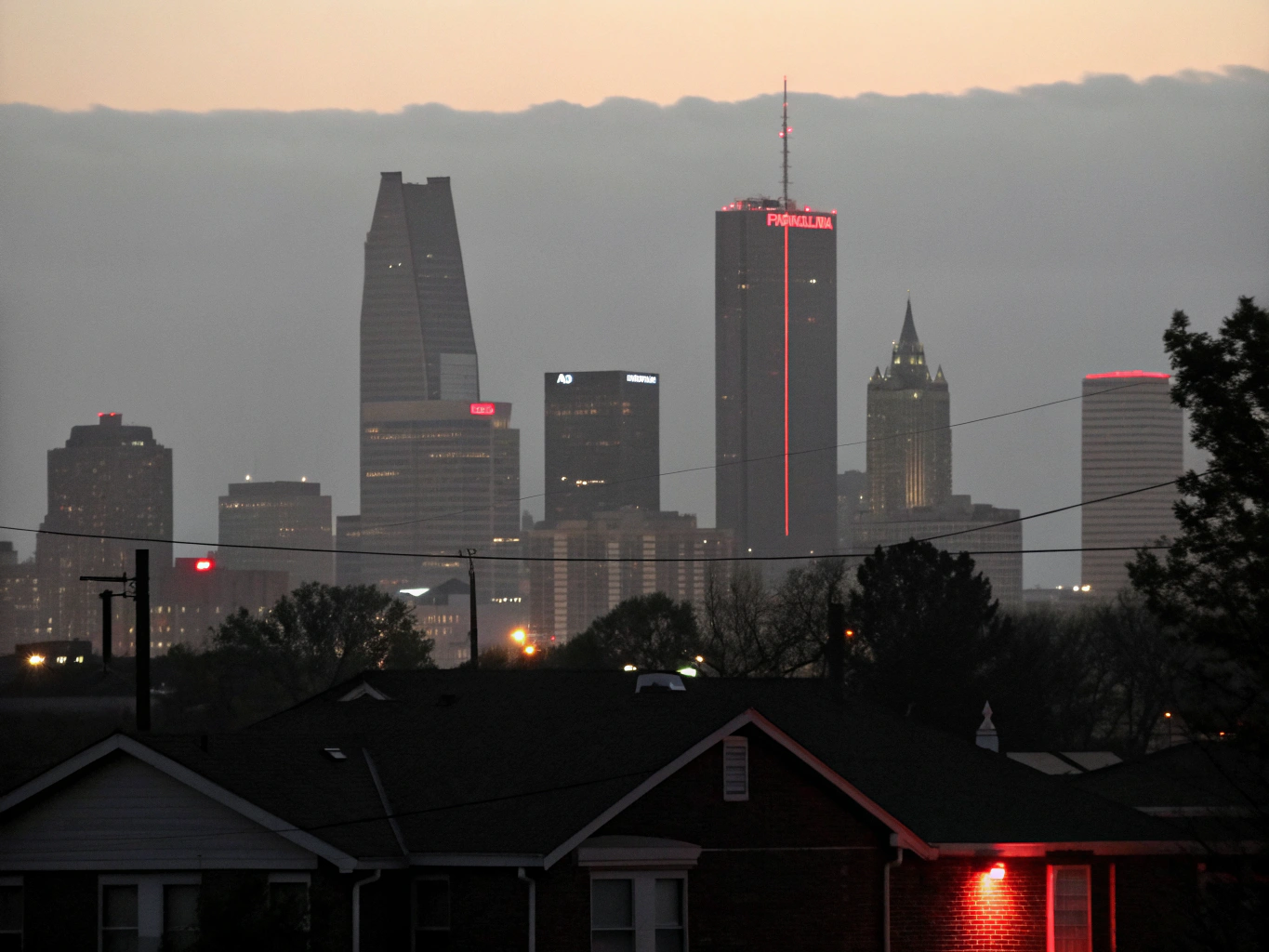 Panoramic view of Oklahoma City skyline with historic Route 66 thoroughfare in foreground