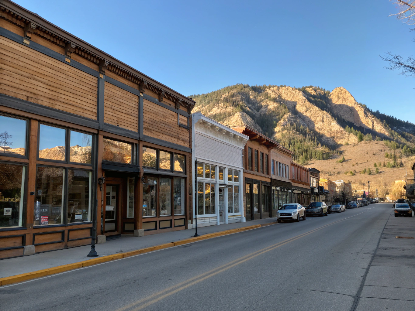 Historic downtown Williams Arizona street lined with classic cars and vintage Route 66 signs